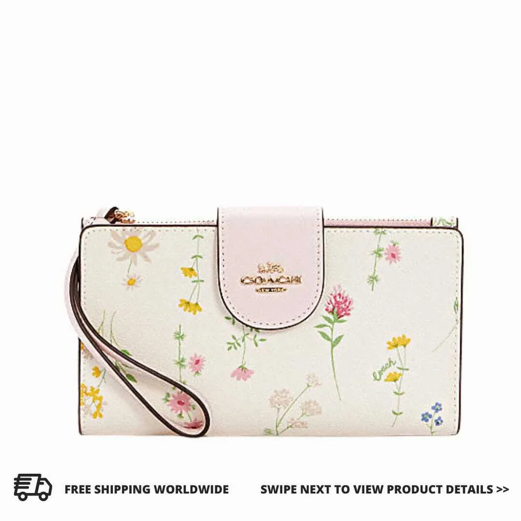 COACH Tech Phone Wallet in Signature Canvas with Spaced Wildflower - www.lasevgi.com